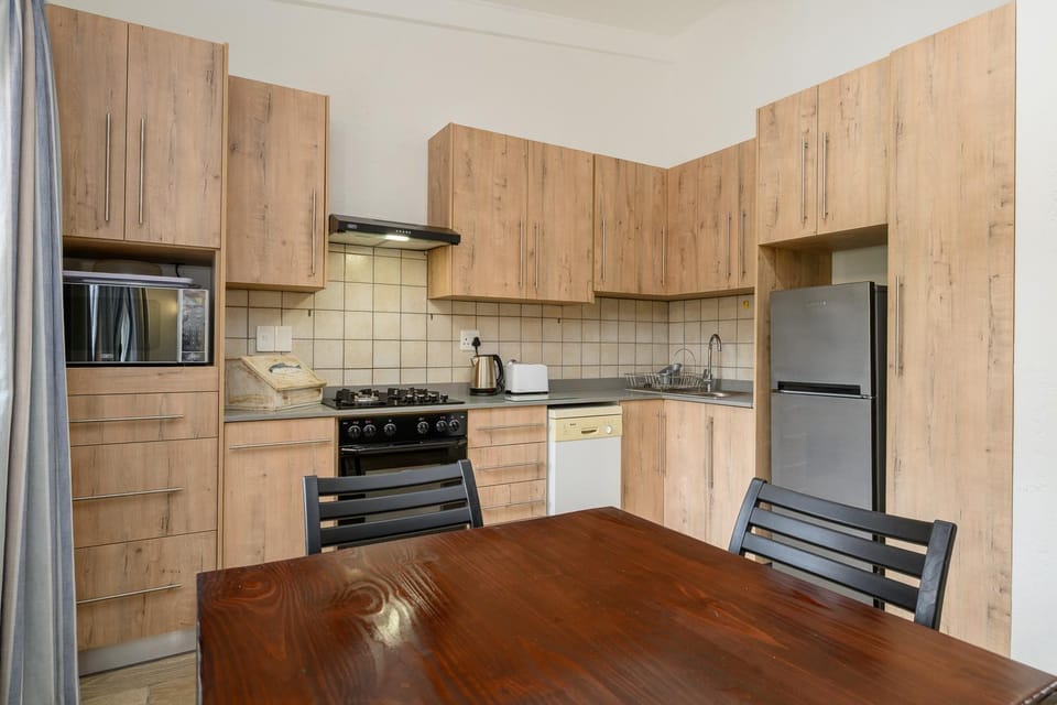 Seating area, dishwasher, microwave, oven, stove, kitchen