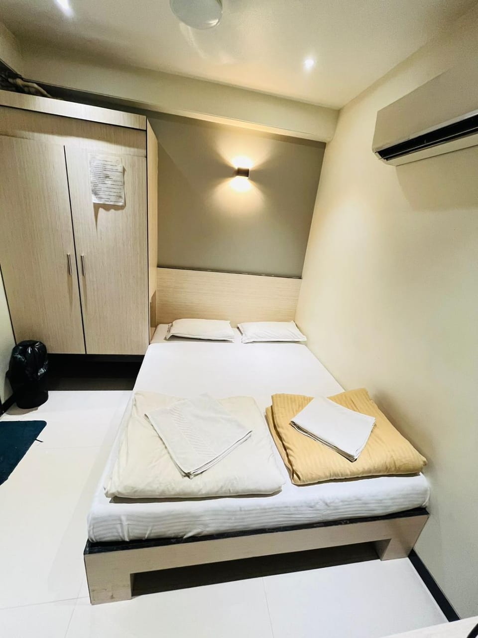 Bed, Photo of the whole room, Bedroom, towels, air conditioner
