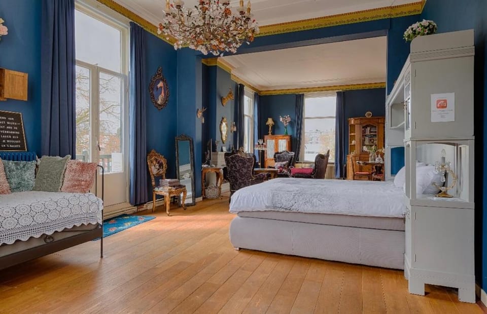 Bed, Living room, Seating area, Bedroom