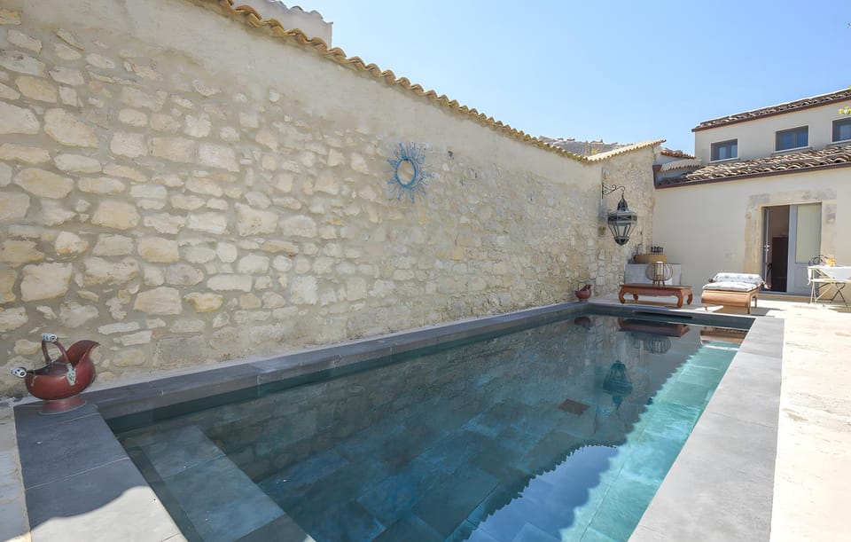 Swimming pool, sunbed