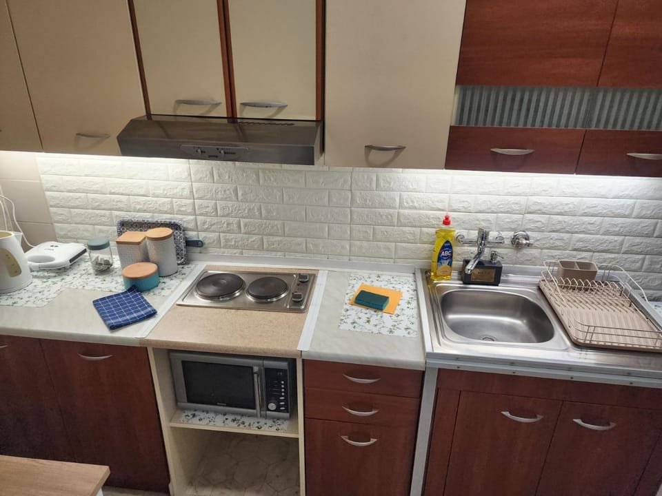 Kitchen or kitchenette, stove