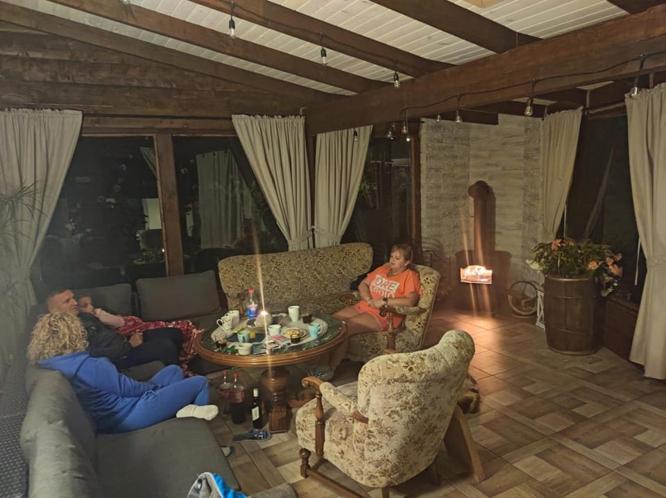 Property building, Living room, Seating area, group of guests