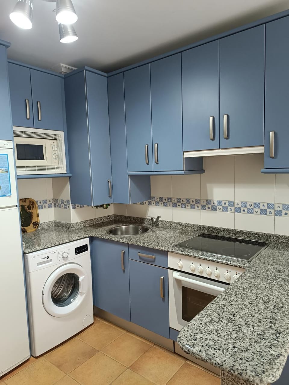 Kitchen or kitchenette, oven, stove