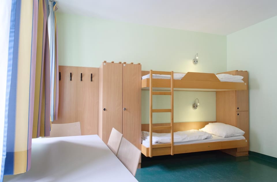 Bed, Photo of the whole room, Seating area, bunk bed, wardrobe