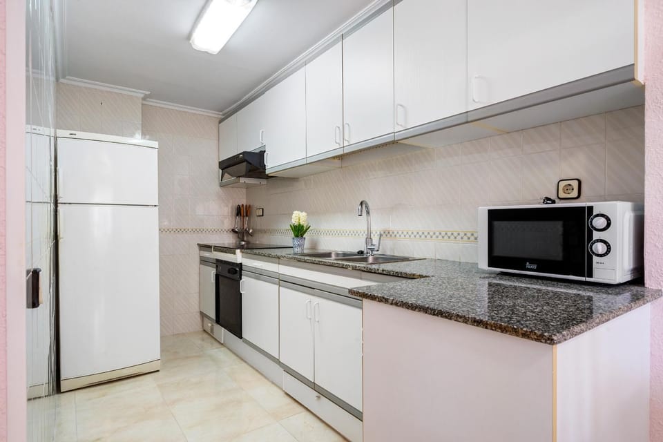 Kitchen or kitchenette, oven