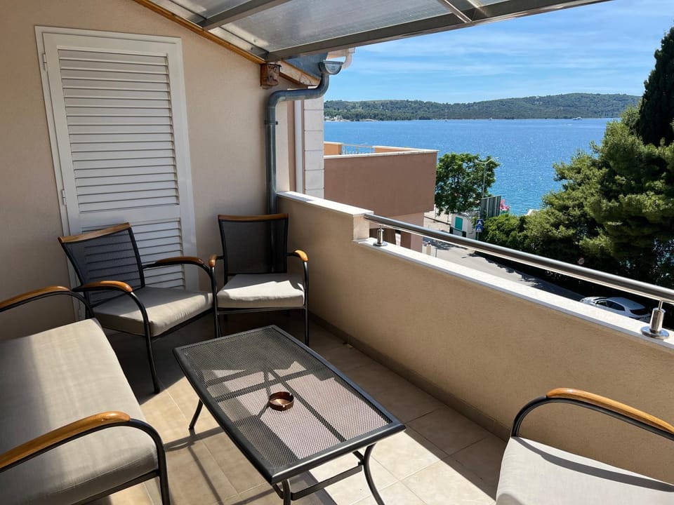 View (from property/room), Balcony/Terrace, Seating area, Beach, Sea view, Sea view