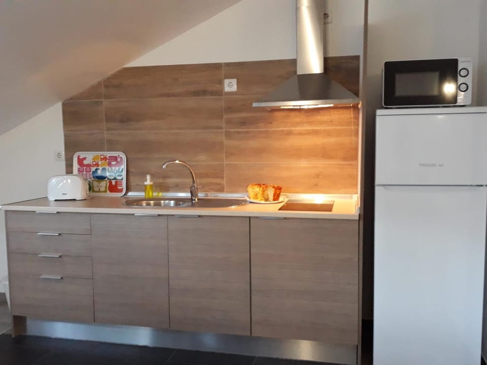 Kitchen or kitchenette, stove