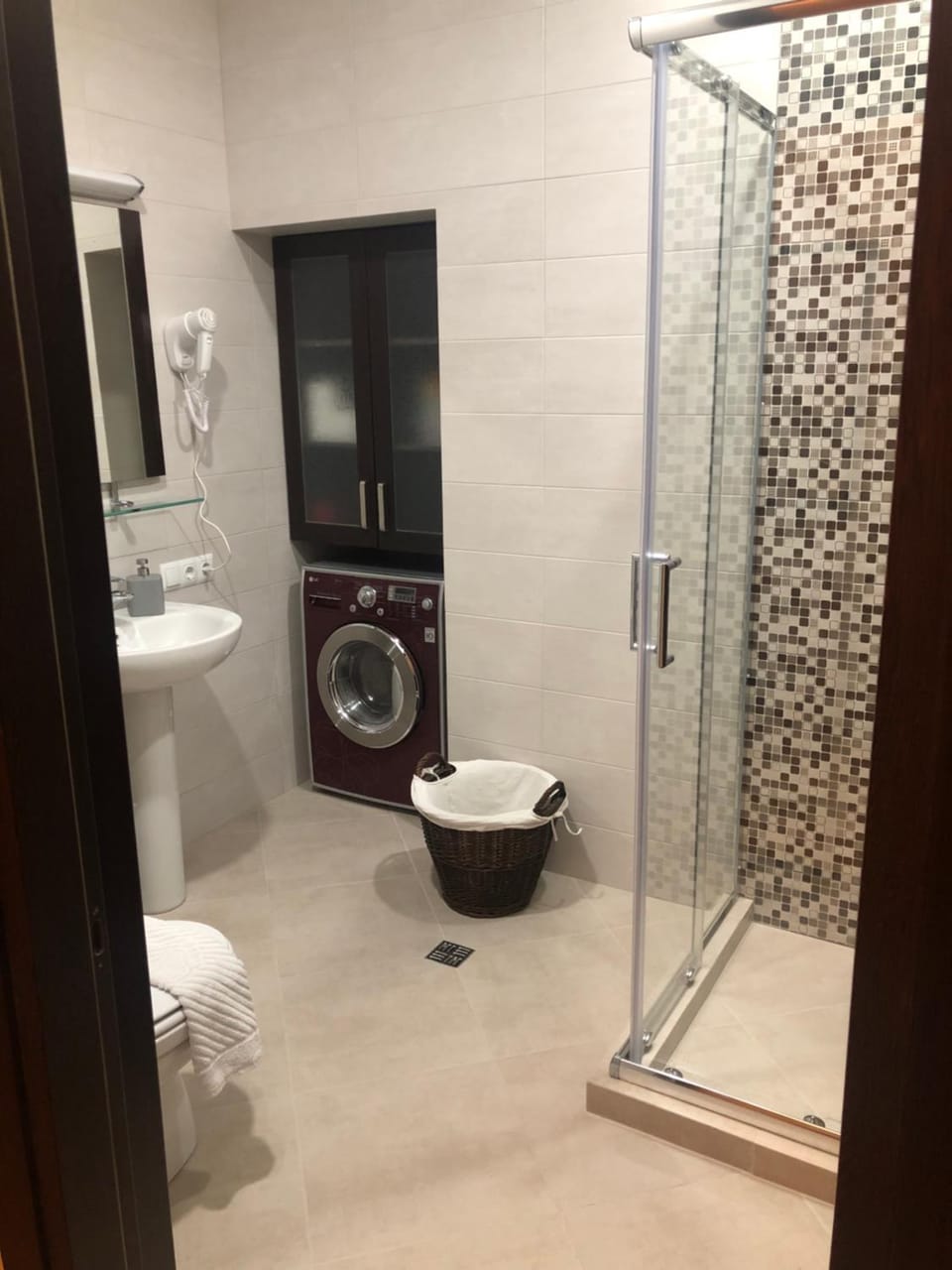 Shower, Toilet, Bathroom, towels, washing machine, dryer