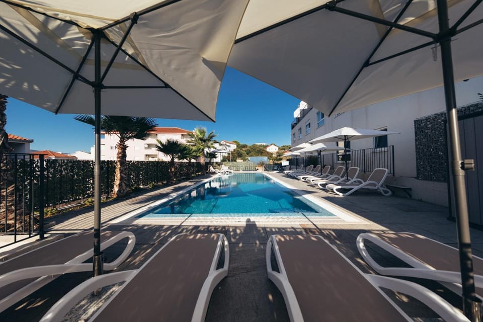 Swimming pool, sunbed