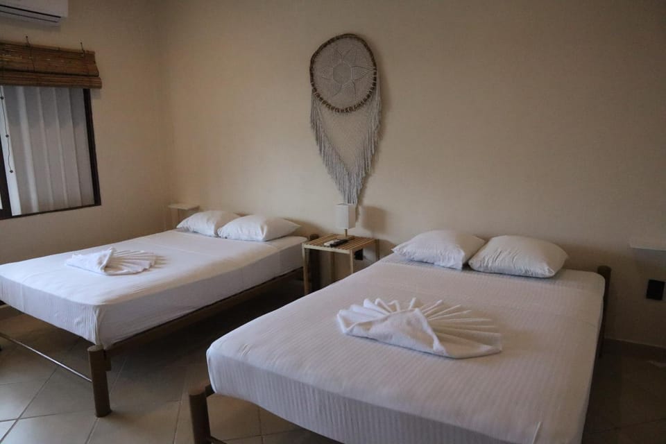 Bed, Photo of the whole room, towels, air conditioner