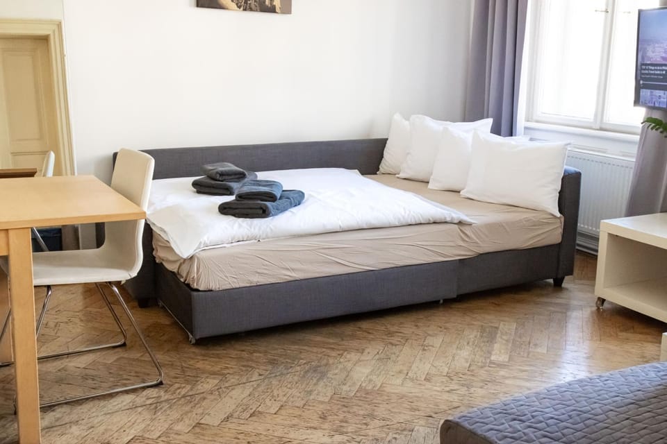 Bed, Living room, Seating area, Bedroom