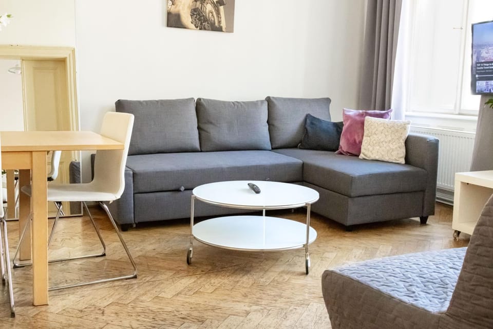 Bed, Living room, Seating area, Bedroom