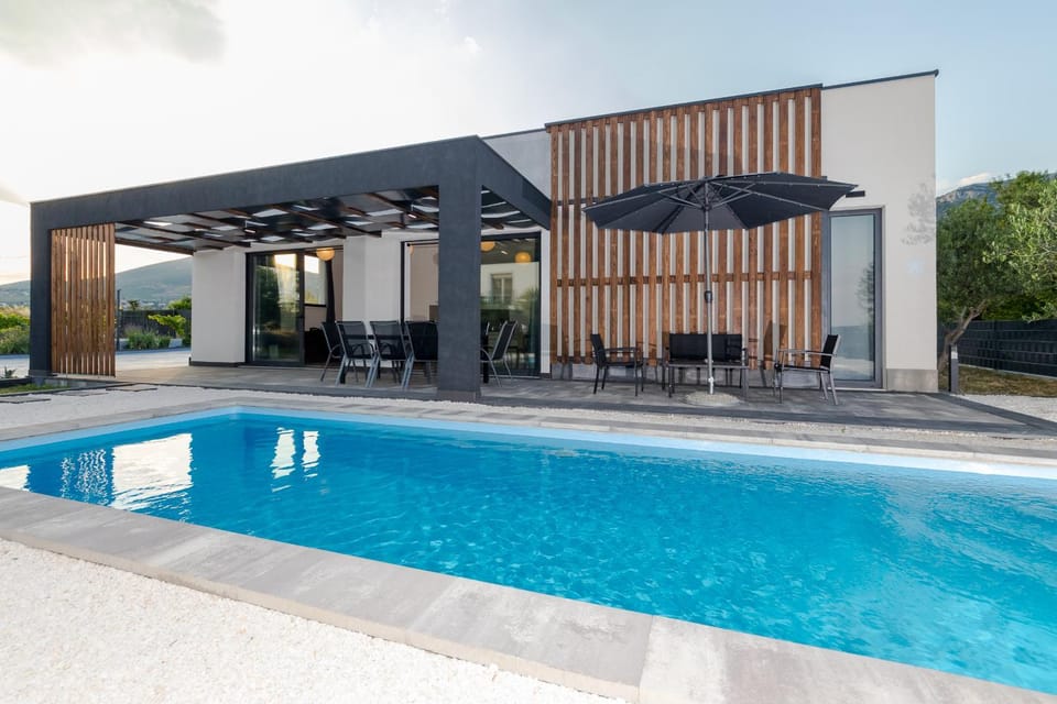 Property building, Patio, Day, Pool view, Swimming pool