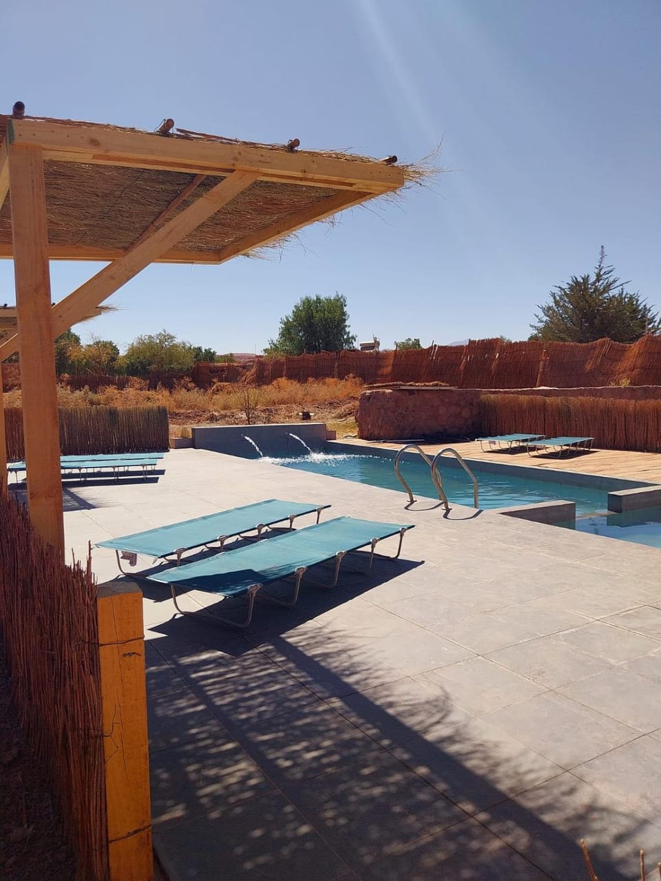 Swimming pool, sunbed