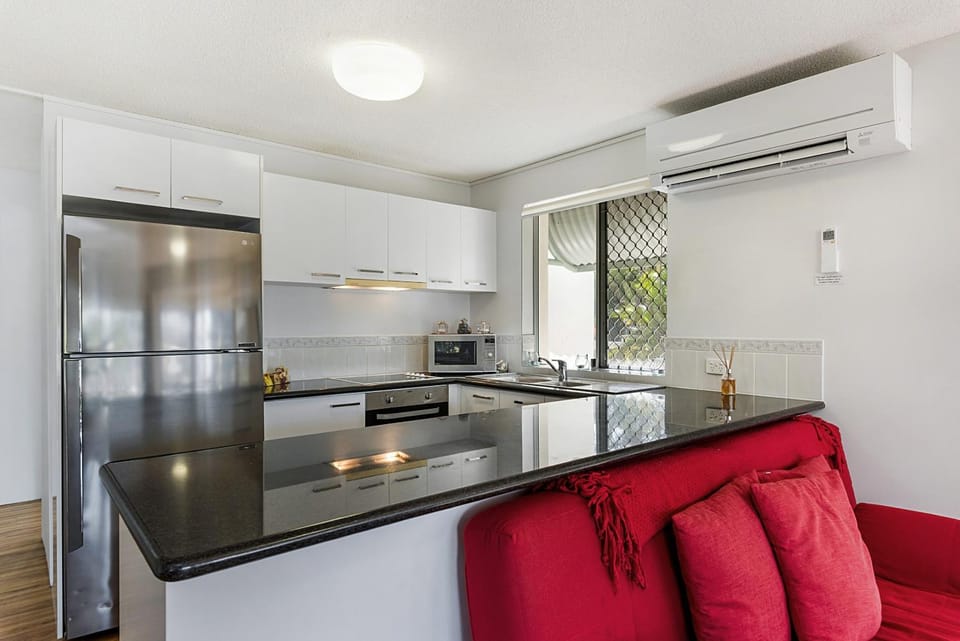 Kitchen or kitchenette, microwave, oven, stove, kitchen