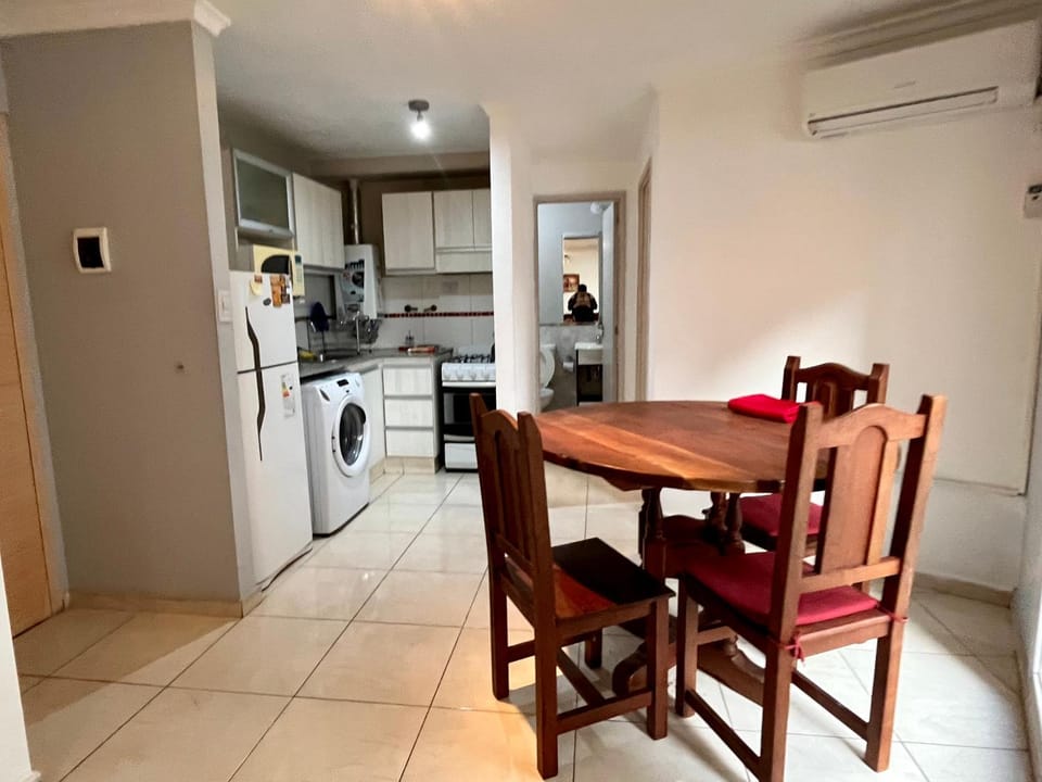Seating area, Dining area, oven, stove, washing machine