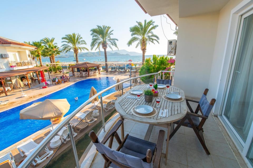 Property building, View (from property/room), Balcony/Terrace, Seating area, Swimming pool, sunbed