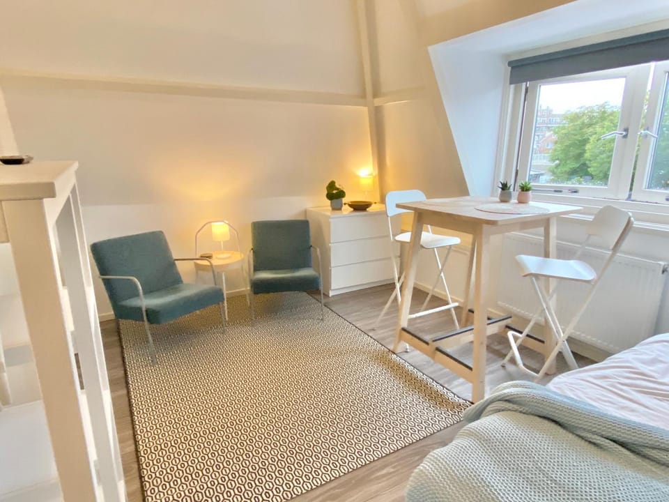 Photo of the whole room, Seating area, Dining area