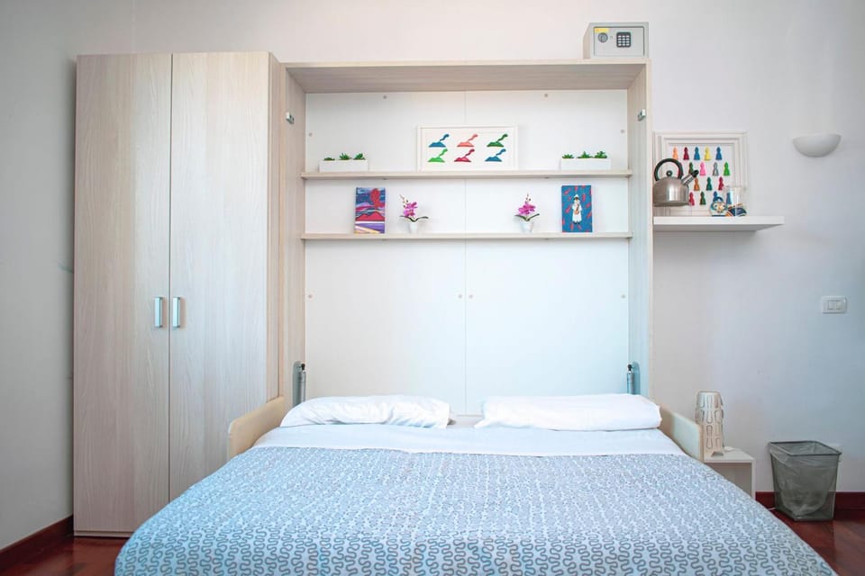 Bed, wardrobe