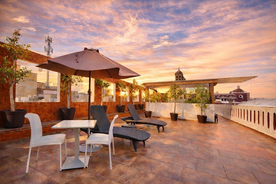 View (from property/room), Seating area, Sunrise