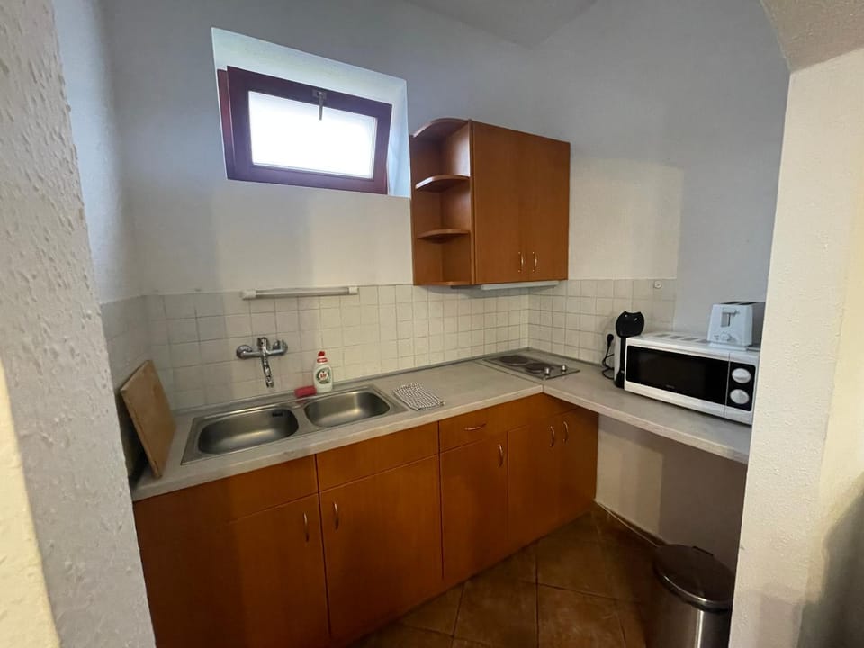 Kitchen or kitchenette, stove