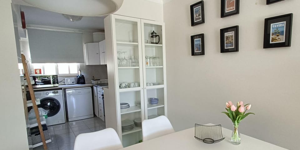 Kitchen or kitchenette, Dining area, stove, washing machine