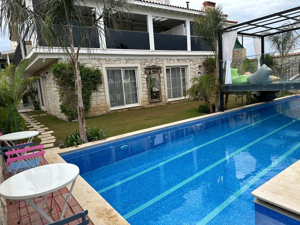 Property building, Patio, Garden, Swimming pool