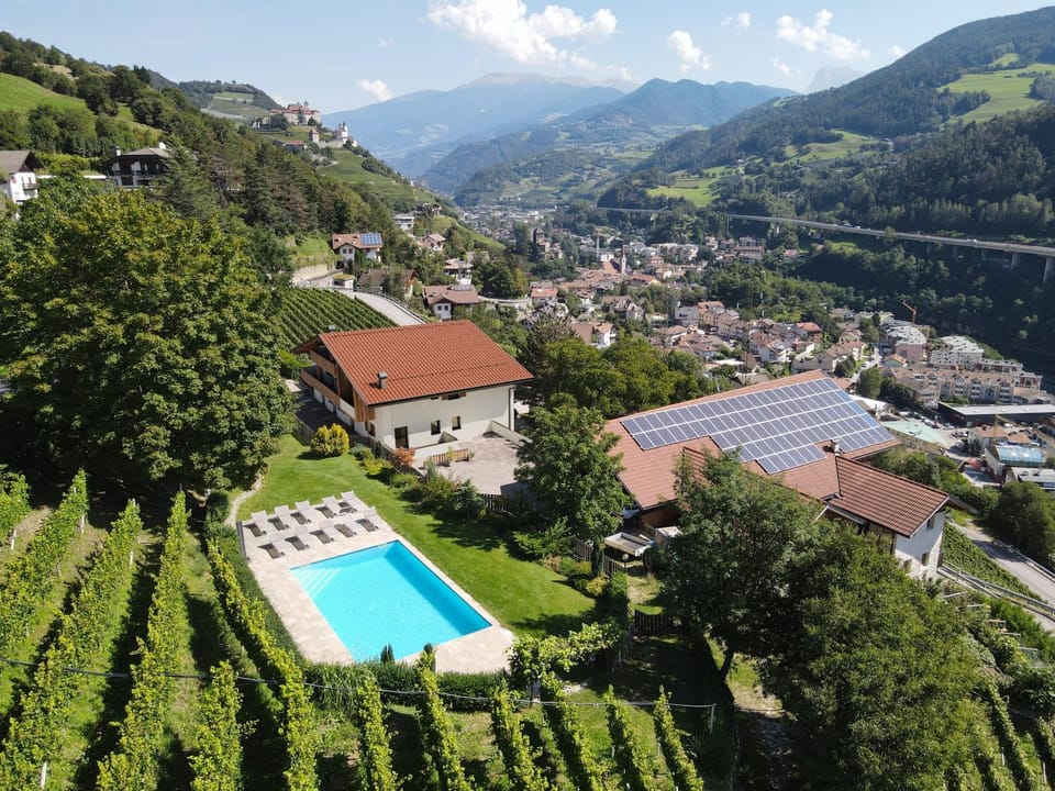Property building, Nearby landmark, Spring, Day, Natural landscape, Bird's eye view, Mountain view, Pool view, sunbed