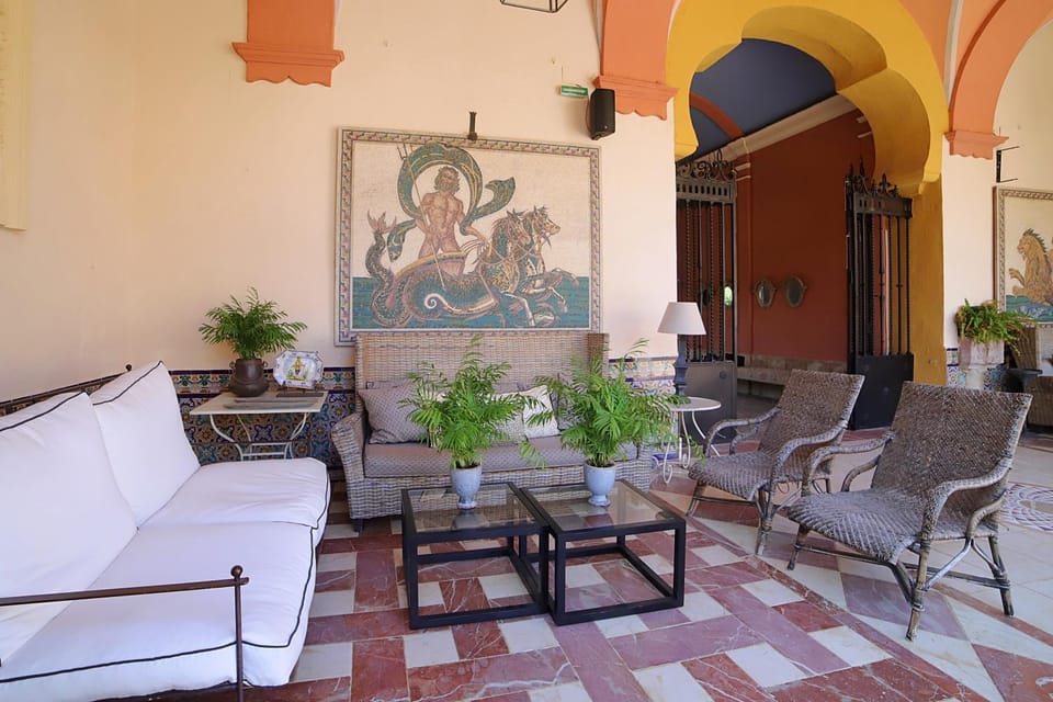 Property building, Patio, Living room, Seating area