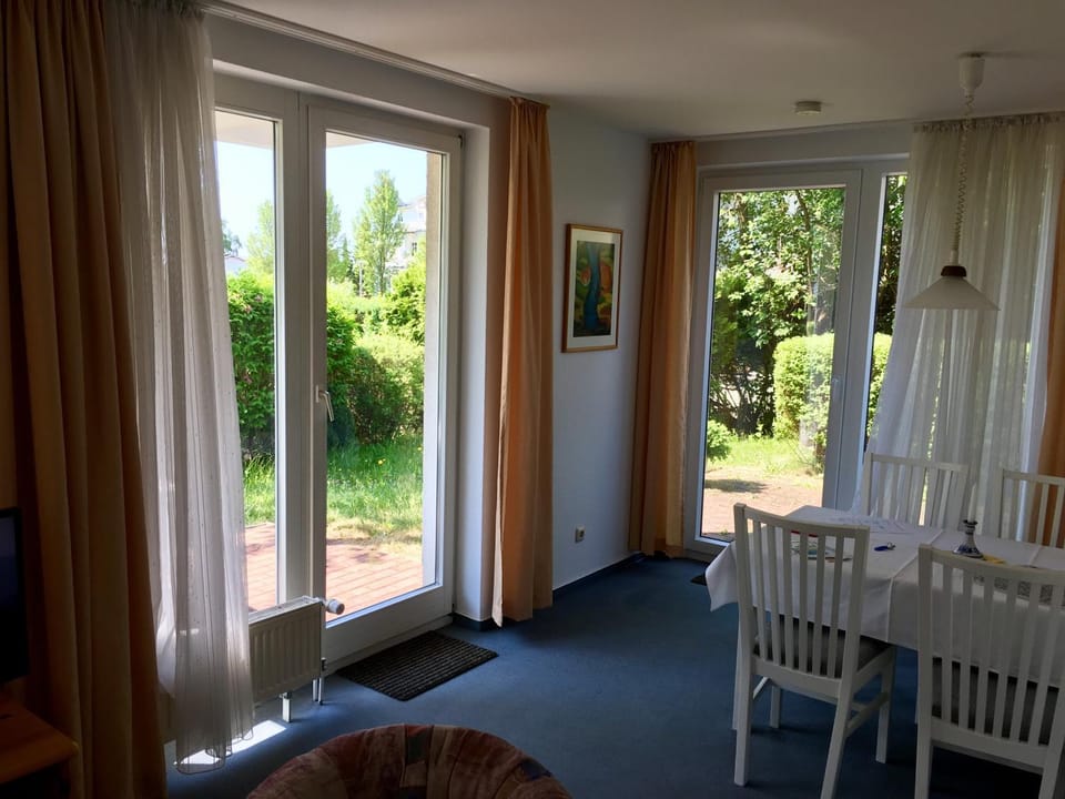 Living room, Seating area, Garden view