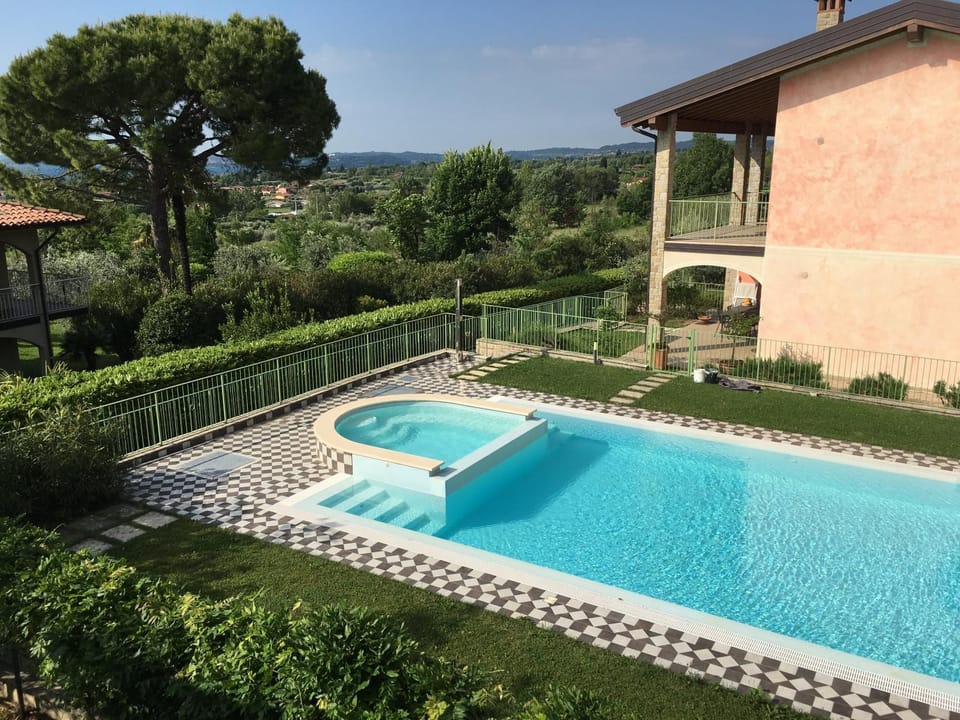 Property building, Natural landscape, Pool view, Swimming pool, sunbed