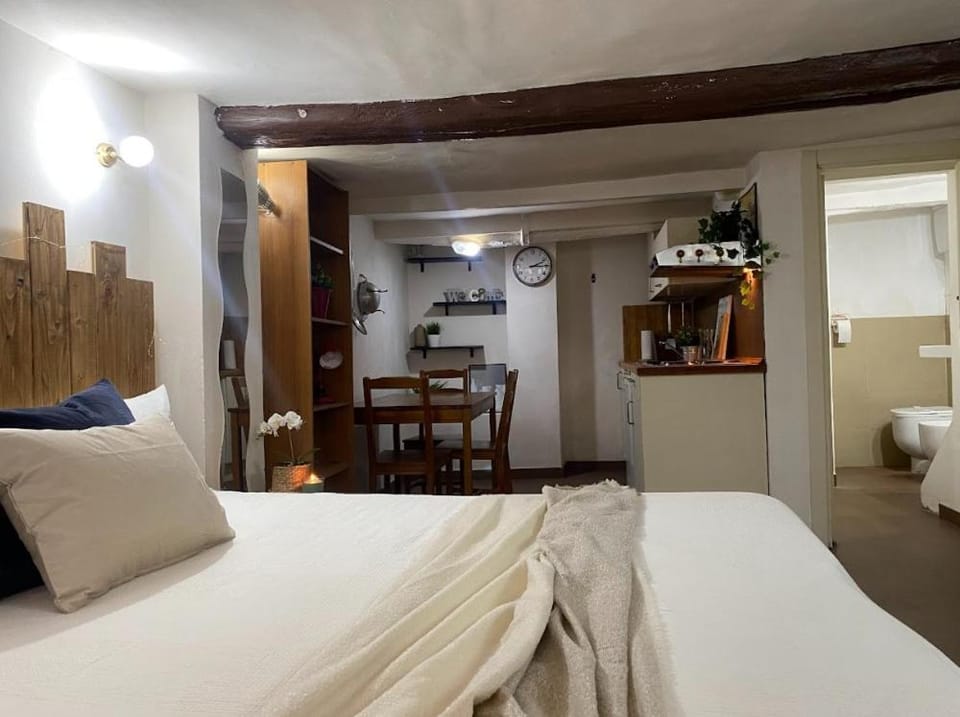 Bed, Living room, Seating area, Bedroom