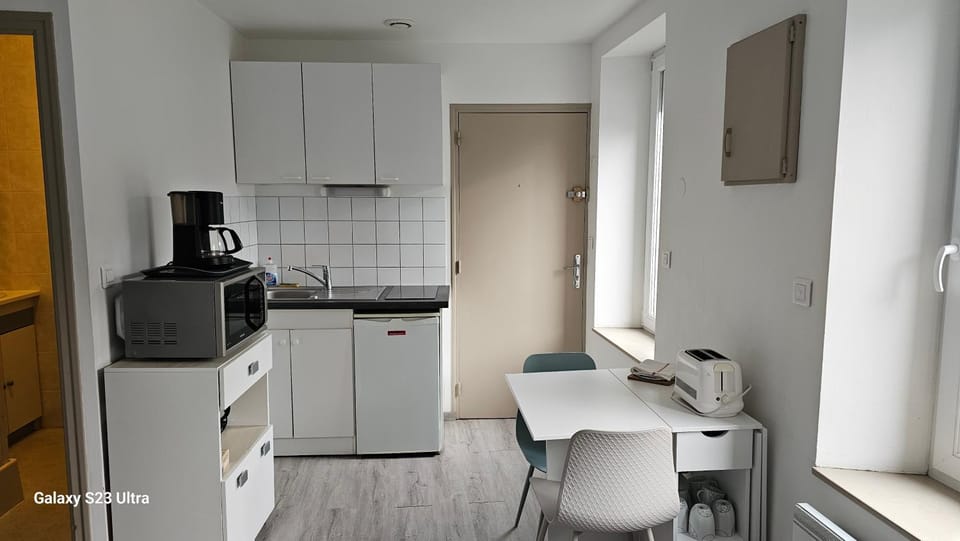 Kitchen or kitchenette, oven, stove, toaster