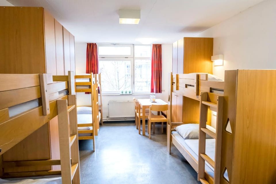 Seating area, bunk bed, wardrobe