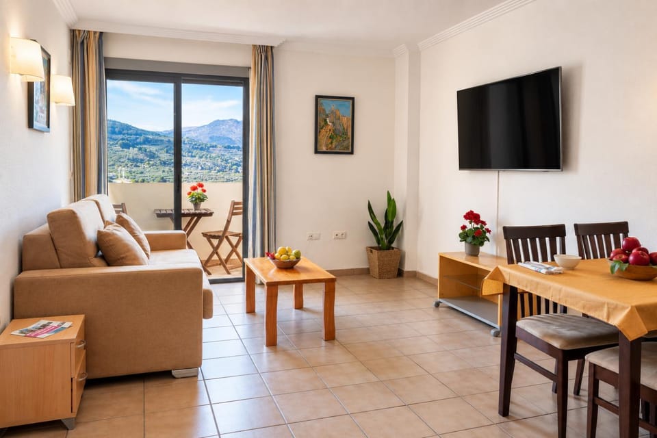 Living room, Dining area, Mountain view, Pool view