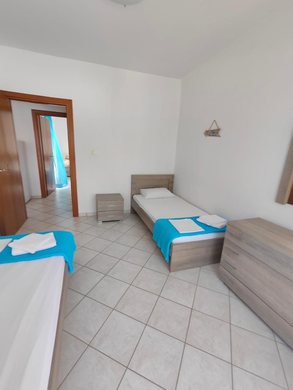 Bed, Bedroom, hair dryier, locker, towels