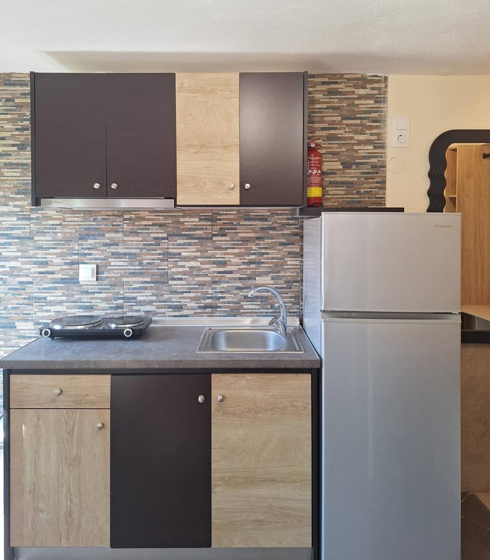 Kitchen or kitchenette, stove