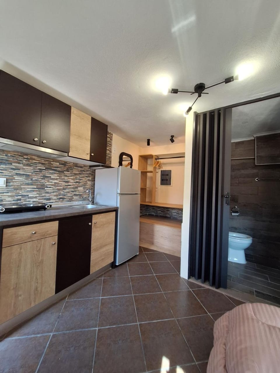 Kitchen or kitchenette, stove