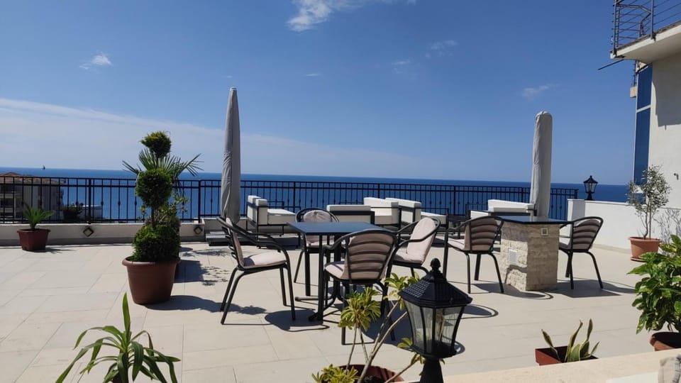 Property building, View (from property/room), Seating area, Sea view