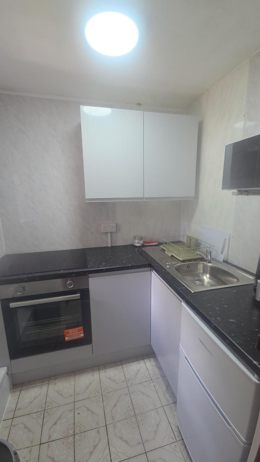 Kitchen or kitchenette, stove
