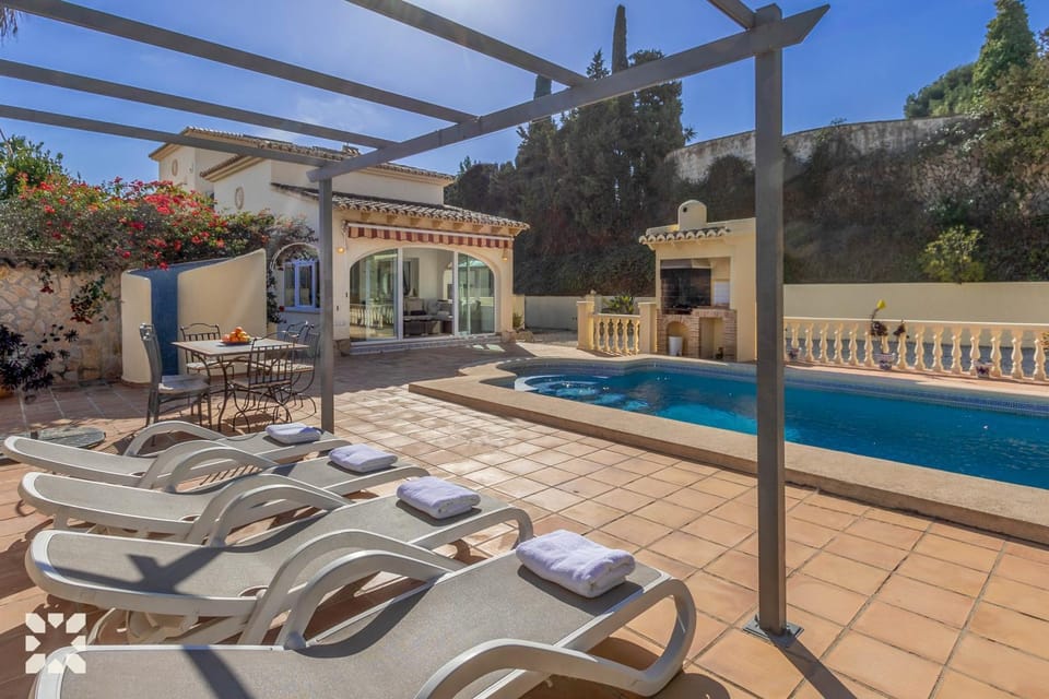 Patio, Day, Natural landscape, Pool view, Swimming pool, sunbed