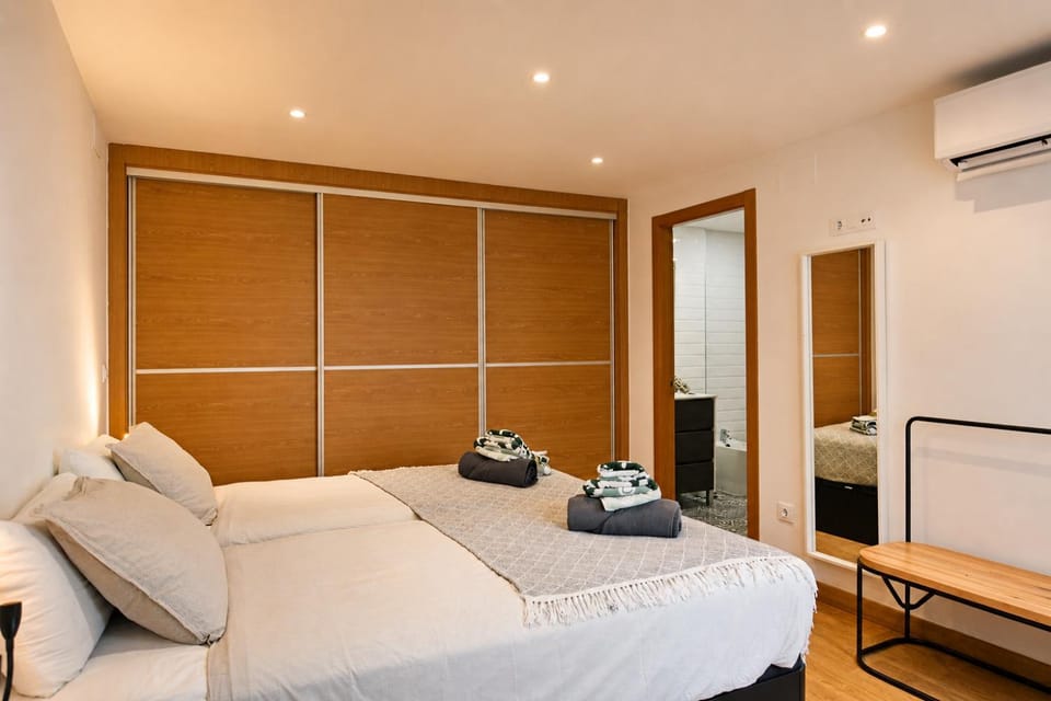 Bed, Bedroom, towels, wardrobe, air conditioner