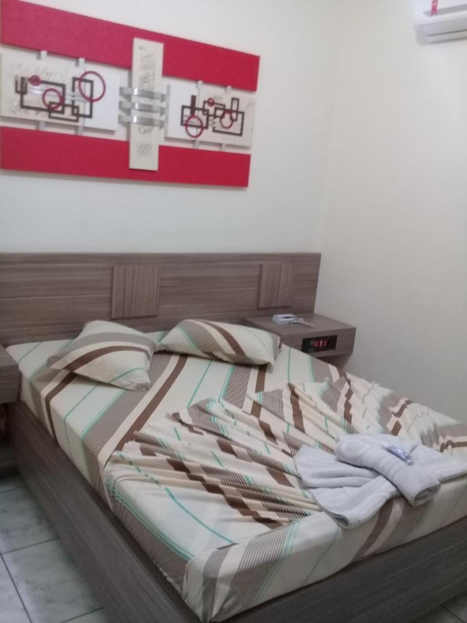 Bed, Photo of the whole room, Bedroom, towels, air conditioner