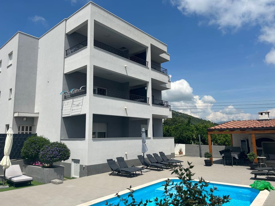 Property building, Patio, Pool view, Swimming pool