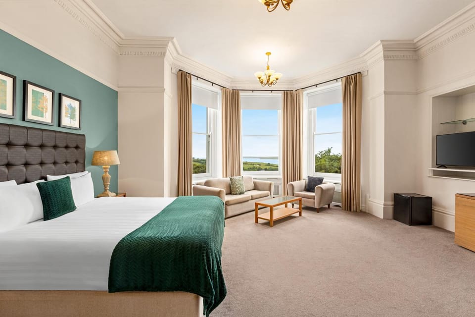 Bed, Seating area, Bedroom, Sea view