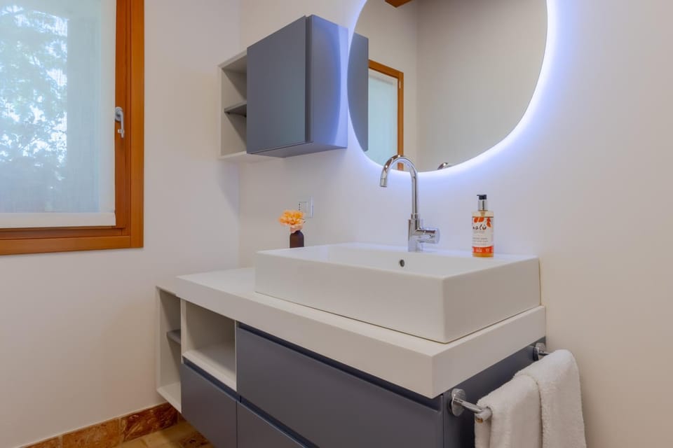 Shower, Toilet, Bathroom, Decorative detail, hair dryier, towels
