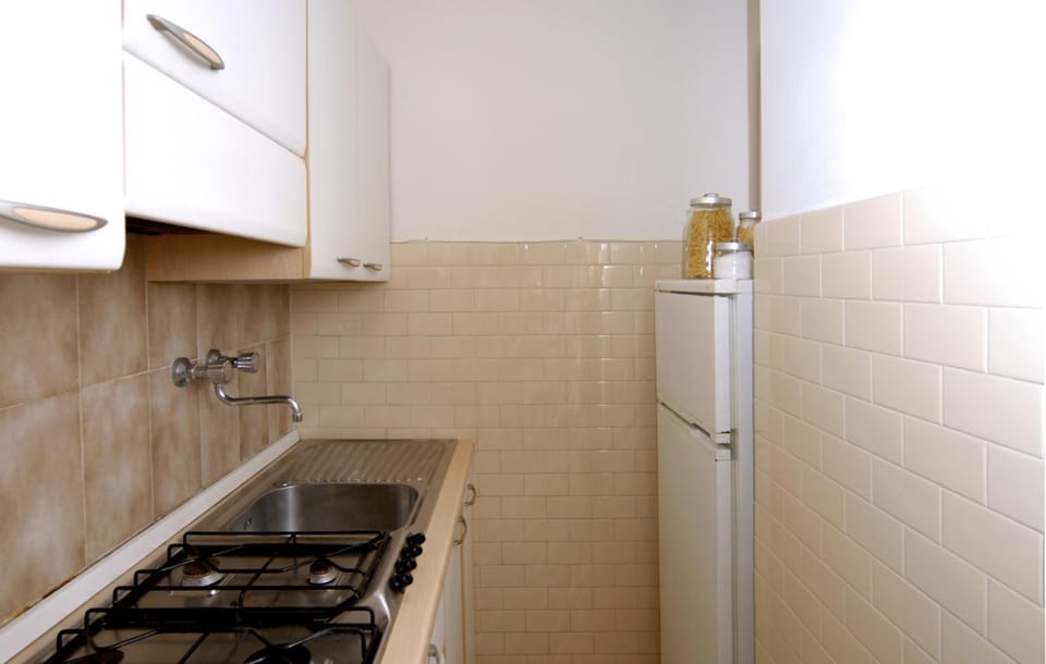Kitchen or kitchenette, stove, kitchen