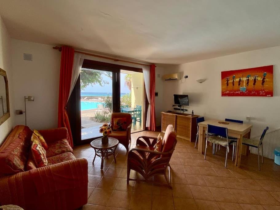 Seating area, Dining area, Pool view, Sea view