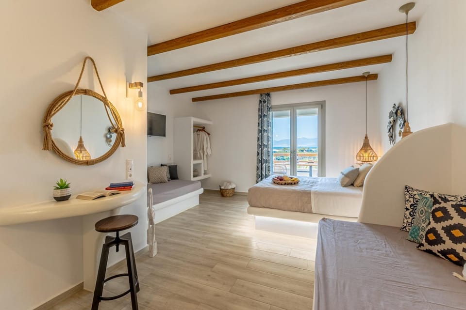 Toilet, Nearby landmark, Staff, Spring, Bed, Day, Night, People, Summer, Bathroom, TV and multimedia, View (from property/room), Balcony/Terrace, Other, Photo of the whole room, Decorative detail, Seating area, Bedroom, Autumn, Text overlay, Guests, Garden view, Landmark view, Mountain view, Street view, Area and facilities, Seasons, Time of day, Sunrise, Sunset, children, young children, older children, group of guests, Family, bidet, flat iron, furniture, hair dryier, internet, locker, safe, soundproof, storage, towels, VIP, wardrobe, wedding, air conditioner