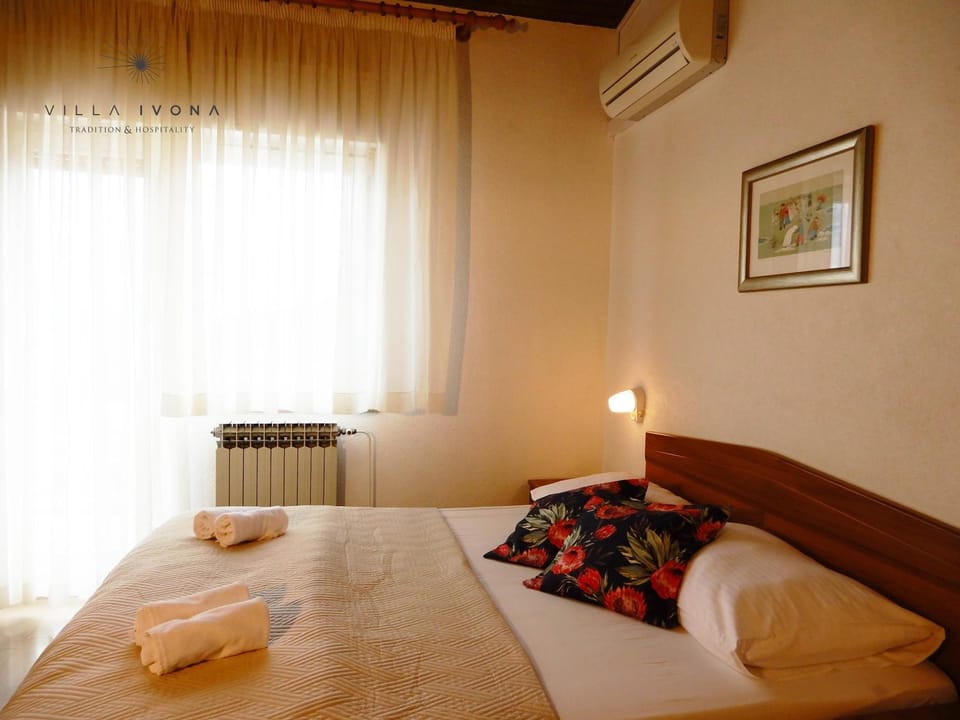 Bed, Property logo or sign, Bedroom